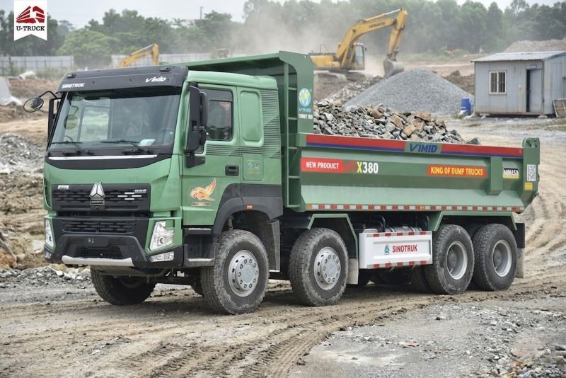 What is the payload capacity of a dump truck for hauling stone? What is the price?